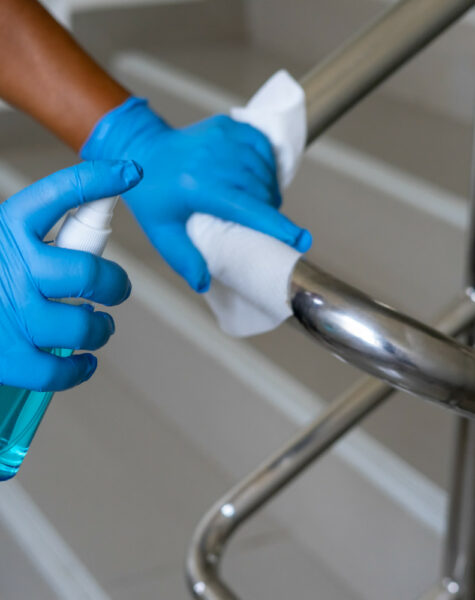 Female,Hand,Using,Wet,Wipe,And,Alcohol,Sanitizer,Spray,To Female,Hand,Using,Wet,Wipe,And,Alcohol,Sanitizer,Spray,To